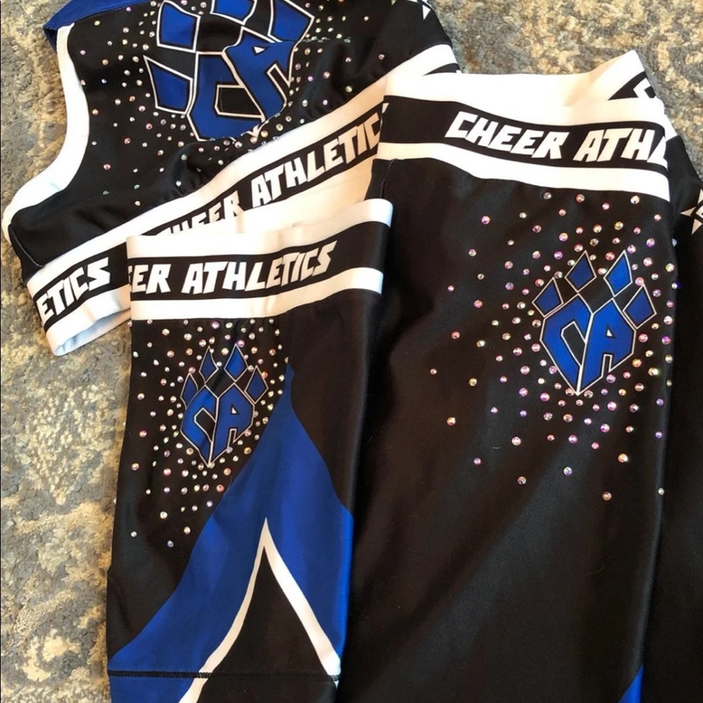 Cheer athletics - Top, shorts and capris.